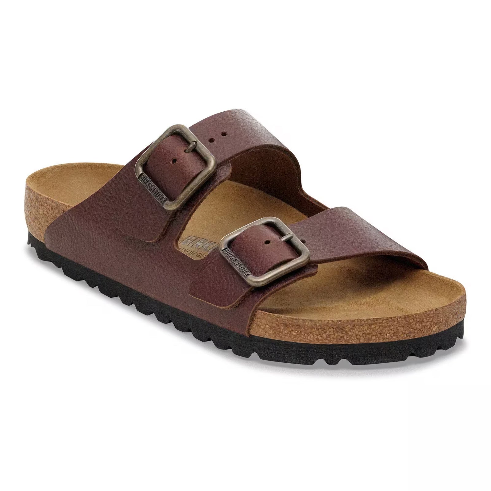 Brown sandal with double buckle on a white background