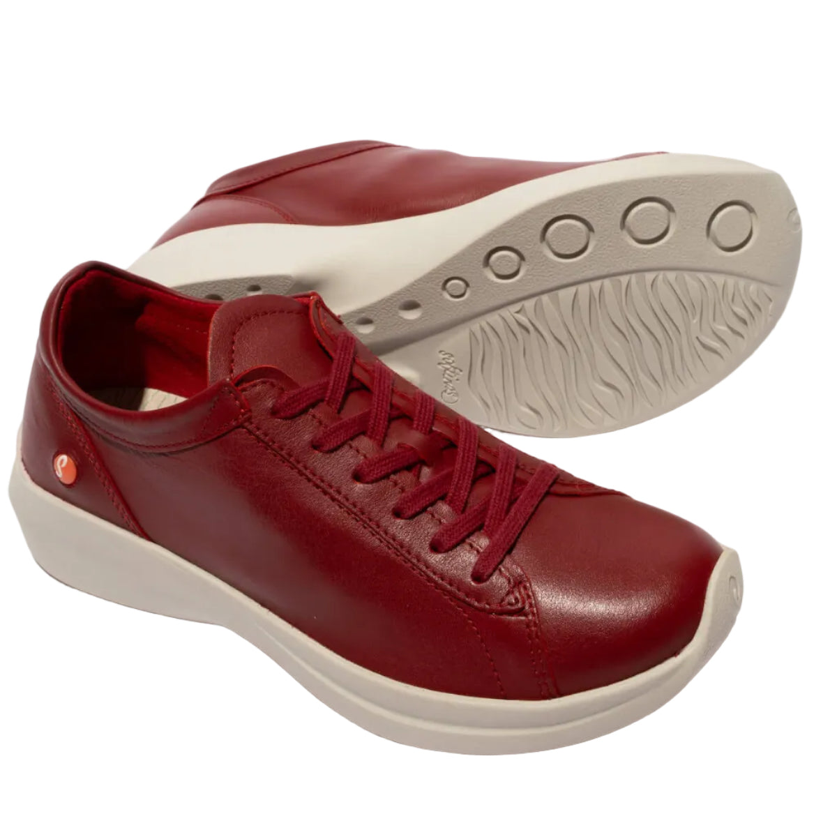 Red leather sneaker with a white sole at Sole Drifter